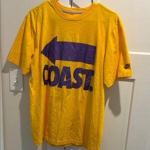 Nike Men's Yellow Tee with Purple Coast Graphic